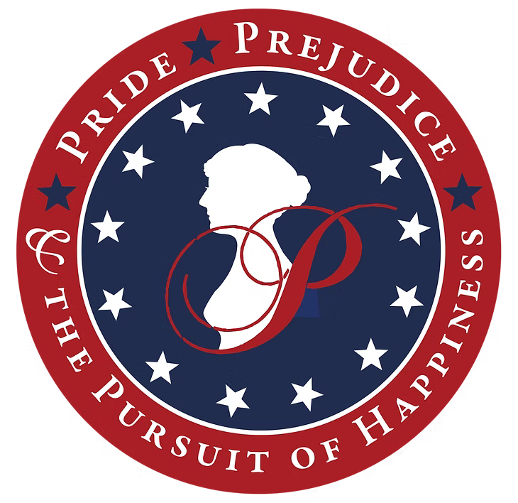 Photograph of a Jane Austen action figurine with bendable arms, a quill pen and a writing desk